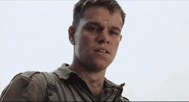 Movie gif. We look up at a young disheveled Matt Damon in Saving Private Ryan as he gradually morphs into a senior man