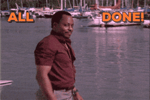 Video gif. A man turns to the camera and smiles at us with satisfaction. He wipes his hands clean of whatever task hes happily finished with. Rainbow flashing text all caps All done